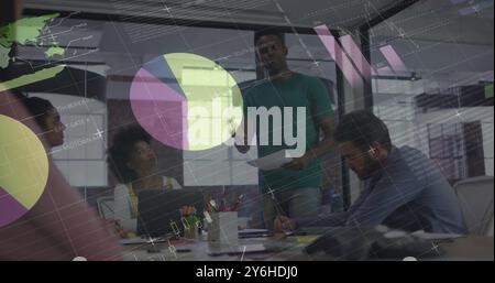 Image of financial data processing over diverse business people in office Stock Photo