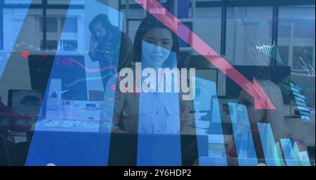 Image of financial data processing over diverse business people in office Stock Photo
