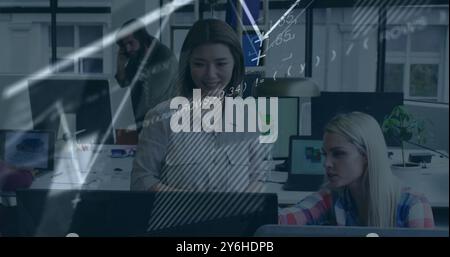 Image of financial data processing over diverse business people in office Stock Photo