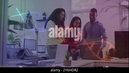 Image of dna strand over diverse business people in office Stock Photo