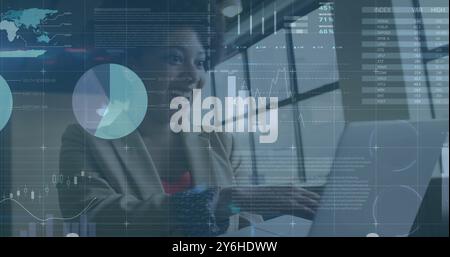 Image of financial data processing over african american businesswoman in office Stock Photo