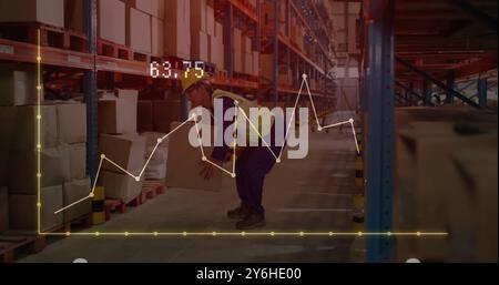 Image of financial data processing over asian male worker in warehouse Stock Photo