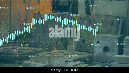 Financial data chart image over industrial machinery in factory Stock Photo