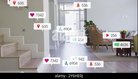 Social media notifications and engagement icons over modern home interior Stock Photo