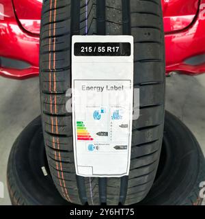 Energy label of car tire , close up of tire energy label showing a rolling resistance and wet grip index , Car tire technology concept Stock Photo