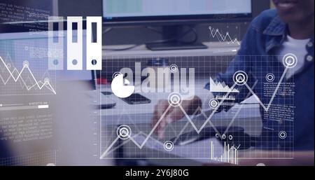 Image of data processing over diverse business people in office Stock Photo