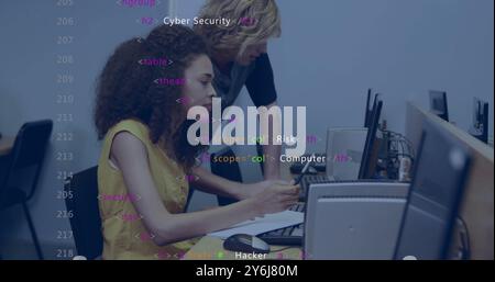Image of data processing over diverse male and female student using computer at desk Stock Photo