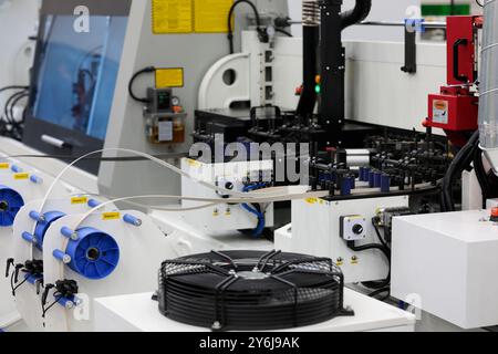 Automatic high speed laser edge banding machine. Selective focus. Stock Photo