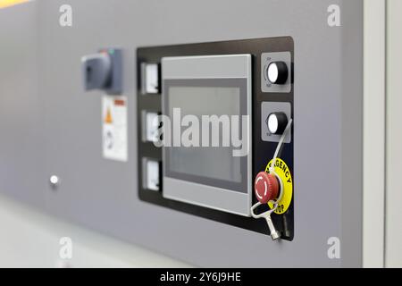 Touch screen control panel of automated industrial equipment close up. Selective focus. Stock Photo