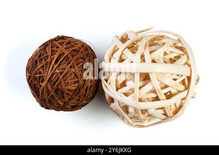 decorative wicker wooden balls on a white background Stock Photo