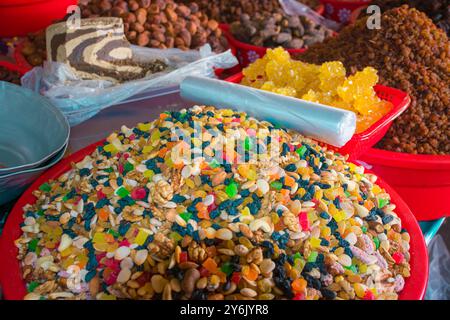 This closeup captures the vivid array of spices available at Chorsu Bazaar in Tashkent, Uzbekistan. The market is renowned for its rich display of col Stock Photo