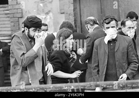 Battle of Bogside , Londonderry Westminister MP Bernadette Devlin is in tears after riot police had fired tear gas into a crowd behind berricades in the bogside area of this city of violence .  Miss Devlin , who won the mid-Derry seat , yesterday protested that a military gas known as CS was being used by Ulster Police . She said it was also used by Americans in Vietnam and issued to Police here by the British Army for use only ' in grave emergency and under strict control '.  14th August 1969 Stock Photo