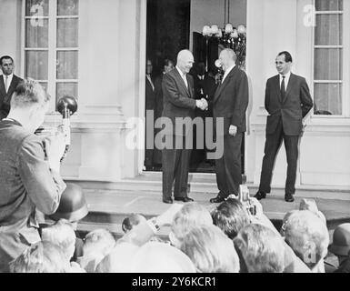 27 August 1959 - Bonn, West Germany Standing on the steps of the West Geman Chancellery to shake hands and meet the press are US President Dwight Eisenhower and Chancellor Konrad Adenauer (interpreter stands at right)  Credit: TopFoto.co.uk Stock Photo