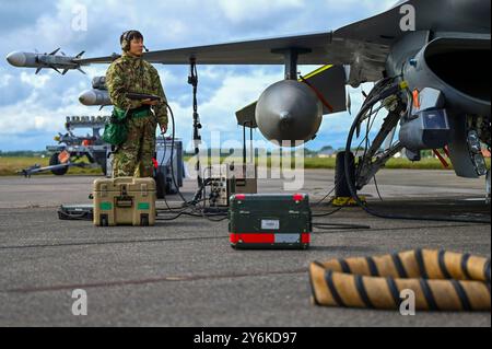 U.S. Air Force Senior Airman Leo Wang, 555th Fighter Generation Squadron weapons load crew member, conducts a pre-flight inspection during exercise Co Stock Photo