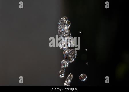 Water drops in dark background Stock Photo
