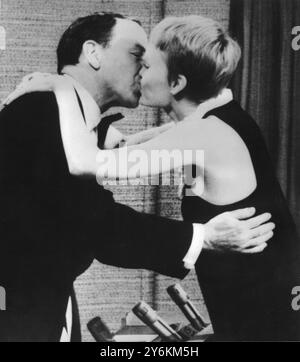 Mr and Mrs Sinatra Frank Sinatra and his wife Mia Farrow kiss on the television show ' What's My Line'   New York - 27 November 1966  Credit: www.TopFoto.co.uk Stock Photo