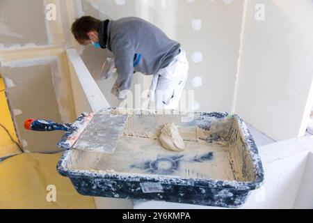 Apprentice making a coating Stock Photo
