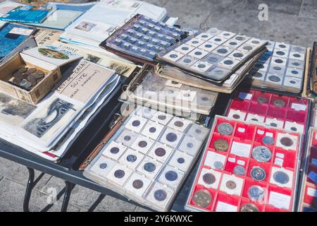 Flea market. Collection of ancient coins. Stock Photo