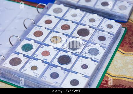 Flea market. Collection of ancient coins. Stock Photo