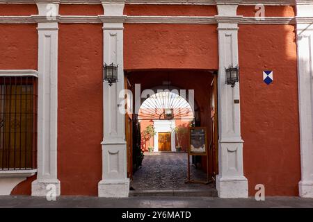 Entrance archway to colonial courtyard museum building in Arequipa, Peru Stock Photo