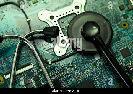 Stethoscope listening to a circuit board, symbolizing tech support, cybersecurity, or hardware health. Stock Photo