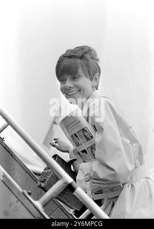 London Airport: American Actress Audrey Hepburn 38, seen today, June 23, before she flew to Geneva after a visit to this country She has made her home in Geneva.  23 June 1967 Stock Photo