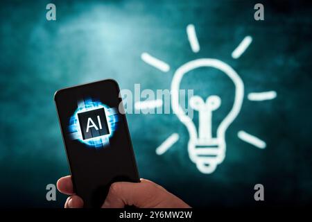 AI idea and innovation. Technology to generate creative solution and inspiration. Light bulb on chalkboard. Green energy and future power, ESG. Stock Photo