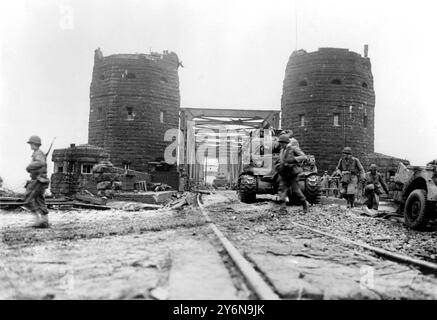 Remagen Bridge in WWII Site of a strategic railway btridge - the Ludendorff Bridge - over the Rhine named after the WWI commander Erich Ludendorff.  On 7th March 1945 members of the US 9th Armoured Division tried to seize the bridge just as German engineers prepared to blow it.  The explosion damaged the bridge but left it still standing.  Under cover of tank fire the riflemen reached the east bank to establish the first Allied bridgehead across the Rhine.  The bridge collapsed 10 days later, but not before adequate tactical bridges were in place. Stock Photo