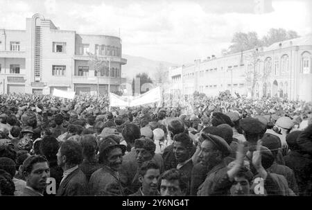 Teheran: Some of the 10,000 demonstrators at the rally called by the Communist constrolled National Association for the struggle against the Anglo Iranian Oil Company, held in parliment Square here in sympathy with workers on strike in the Persian oil area. Abadan, the oil refinery centre, is paralysed by the terrorist action of demonstrators. The refinary has closed down as the result of picketing, and terrorists have threateded to kill workers if they load tankers.  Troops and tanks have been called out in Abadan  16 April 1951 Stock Photo