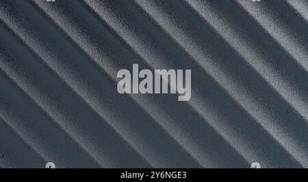 Abstract matte black  plastic wave background macro close up view Stock Photo