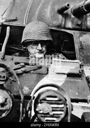 A German general in an American helmet sitting inside a US armoured car, Lieut Gen Karl Spang captured near Brest waiting to be driven off to captivity August 1944  ©2004 Topfoto Stock Photo