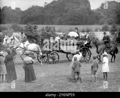 The Social Event of the Year. The King and Queen accompanied by the Prince of Wales and Princess Mary arriving on the course for the opening day of the great Ascot meeting - the biggest social event of the year in England. 14 June 1921 Stock Photo