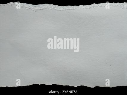 Piece of torn ripped blank paper. isolated on white . Stock Photo