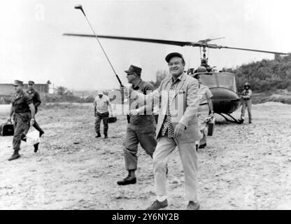 Bob Hope arrives for Christmas to entertain the troops in Da Nang, Vietnam. 1967     Hope, Bob (orig. Leslie Townes Hope) US (English-born) actor and comedian; host or co-host of Academy Awards ceremony eighteen times 1939-1977; with Bing Crosby, co-starred in seven 'Road' movies 1940-1962; known for overseas tours entertaining US troops, especially at Christmas, beginning in 1941; co-wrote memoir 'Don't Shoot, It's Only Me' 1990; named honorary US veteran by Congress 1997 (only person to be so designated)  1903-2003 Stock Photo