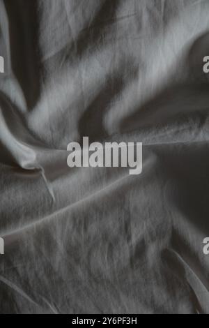 Gray textile folded fabric for background. Top view. Stock Photo