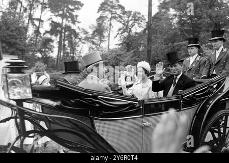 HORSE RACING ROYAL ASCOT QUEEN ELIZABETH II WITH DUKE OF EDINBURGH IN OPEN CARRIAGE DRIVE  ;  20 JUNE 1962   Ascot , Berkshire ; Smiling and waving from their open landau to their fellow racegoers are HM Queen Elizabeth II and HRH Prince Philip here for the second day of the four day Royal Ascot race meeting .  Also riding in the carriage with the Royal couple were The Duke of Gloucester and the Dukke of Beaufort .  20 June 1962 Stock Photo