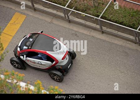 Renault Twizy electric car driving through the centre of Monte-Carlo, Monaco, French Riviera. Stock Photo