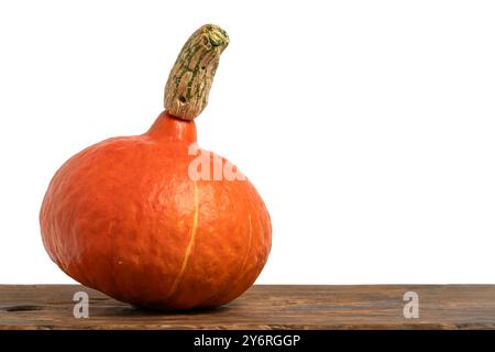 Pumpkin on wooden table isolated on white background Stock Photo
