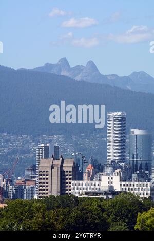 Looking north towards the towers of downtown Vancouver, The Lions peaks and the North Shore Mountains, Vancouver, British Columbia, Canada. Stock Photo