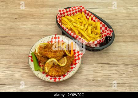 Chicken wings can be cooked in a variety of ways, such as baked, grilled, fried, or even in the air fryer Stock Photo