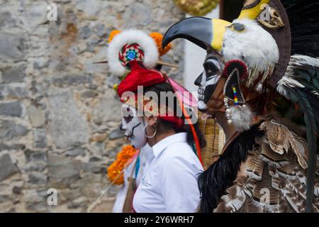 Cuetzalan, Puebla, México; noviembre 01 2021:People dressed in costumes to celebrate the day of the dead Stock Photo