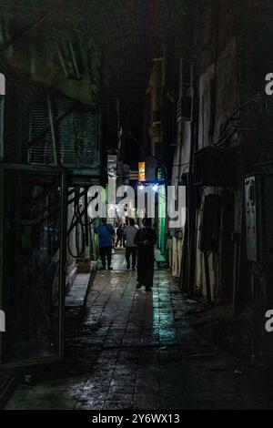 RIYADH, SAUDI ARABIA - NOVEMBER 29, 2021: Dark alley in Almarqab neighborhood of Riyadh, Saudi Arabia Stock Photo