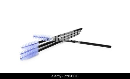 Many disposable makeup brushes isolated on white Stock Photo