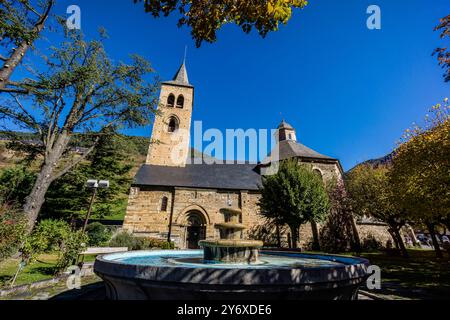 Gothic-style bell tower, around the 14th century, Romanesque church of Sant Felix de Vilac, 12th century, , Vilac , municipality of Vielha e Mijaran , Aran Valley, Spain. Stock Photo