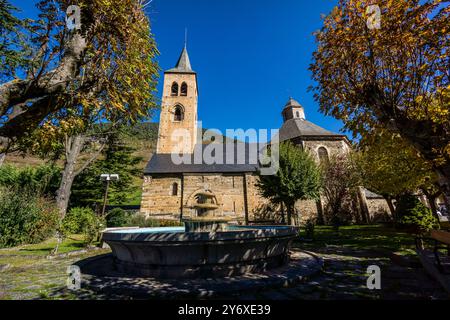 Gothic-style bell tower, around the 14th century, Romanesque church of Sant Felix de Vilac, 12th century, , Vilac , municipality of Vielha e Mijaran , Aran Valley, Spain. Stock Photo