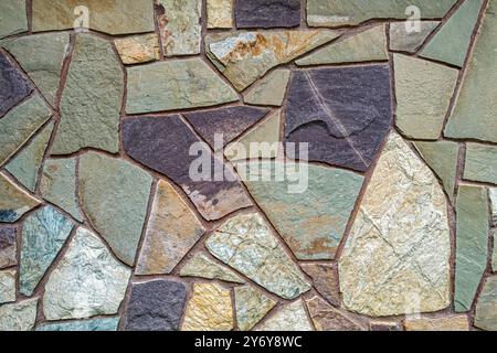 Stone cladding detail on an exterior wall of a chapel Stock Photo