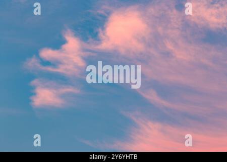 Pink clouds against blue sky Stock Photo
