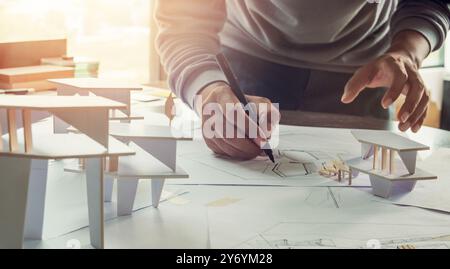 architect design working drawing sketch plans blueprints and mak Stock Photo