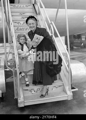 HAPPY HOLIDAYS   Actress Virginia Field and her four-year-old daughter , Margaret , are pictured when they arrived at London Airport by Pan American Airways Stratocruiser from New York . Miss . Fields has been appearing in a New York play called  ' Light up the Sky ' , and is here to spend a holiday with her parents in London . Little Margaret brought her dolly with her for company .     15 September 1949 Stock Photo