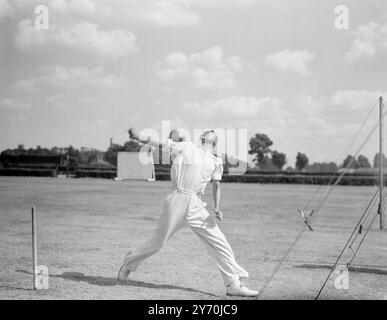 INDIAN FAST BOWLER MAY BE ONE OF A WORLD'S BEST .   Seen in action at the cricket school in London is D.G . PHADKAR , young Indian test cricketer who in the opinion of Alf Gover, Surrey and England fast bowler - is likely to become one of the worlds leading fast bowlers.  A native of Bombay,Phadkar was sent to England by air by the Indian cricket board of control for two months coaching by Gover . He has already represented India in eight tests- four against Australia and four against the West Indies .  An employee of Air India, he has been given special  leave for the coaching .    June 30 19 Stock Photo